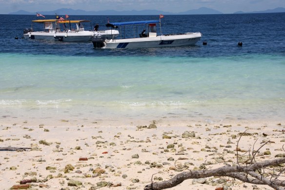 Dive boats at beautiful Sipadan island
