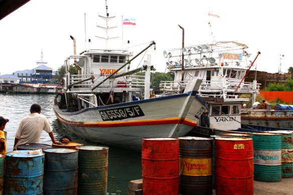 Fishing boat and squid fishing boat in Semporna harbour