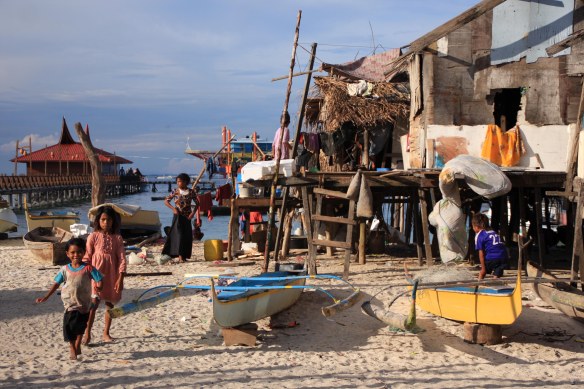 Shanty town next to Scuba Junkie resort